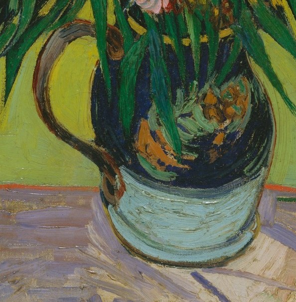 The vase's sturdy form grounds the composition, and its decorative pattern adds a touch of artisanal craft.
