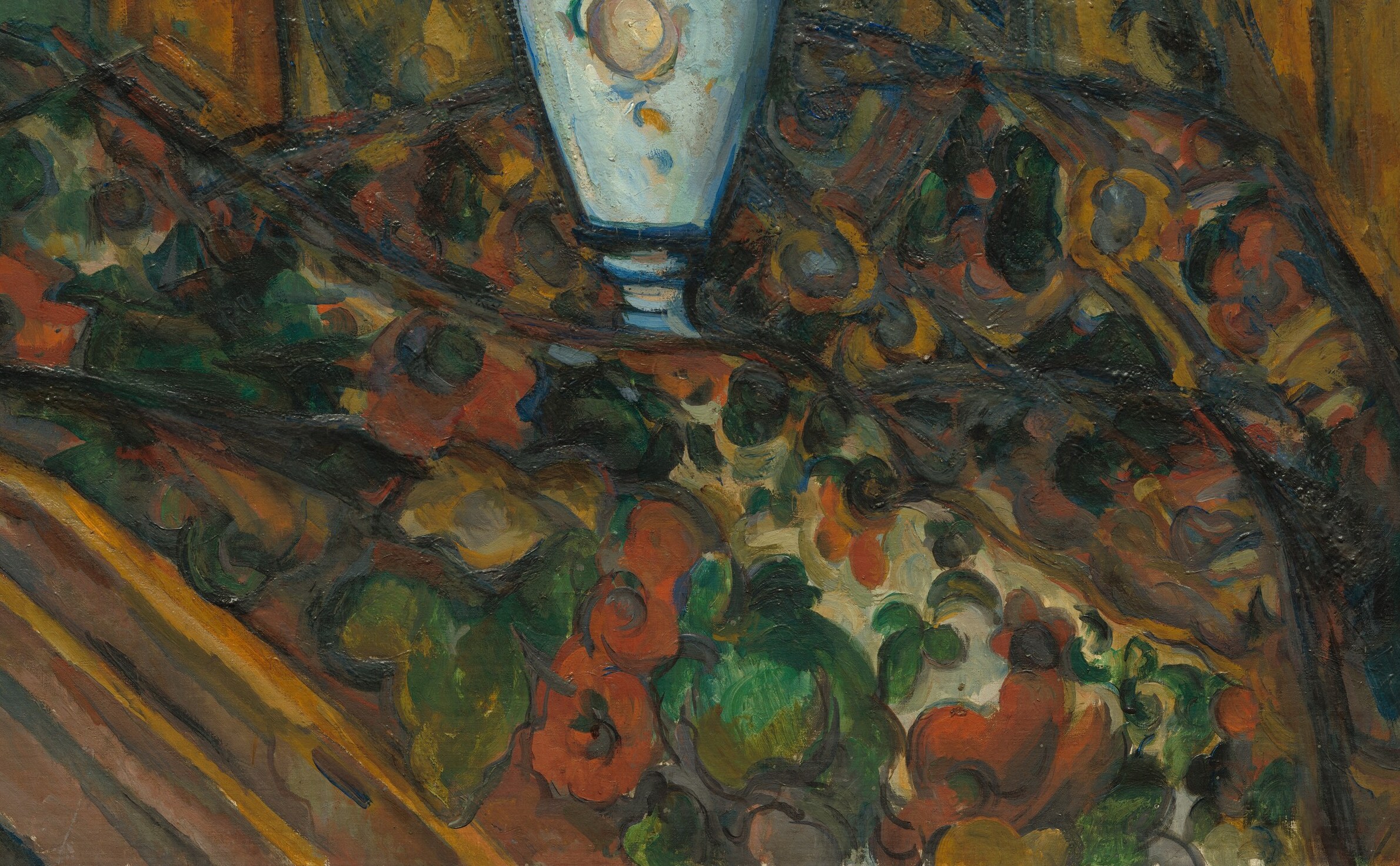 A rich, competing pattern that creates spatial tension with the bouquet and pushes the vase forward