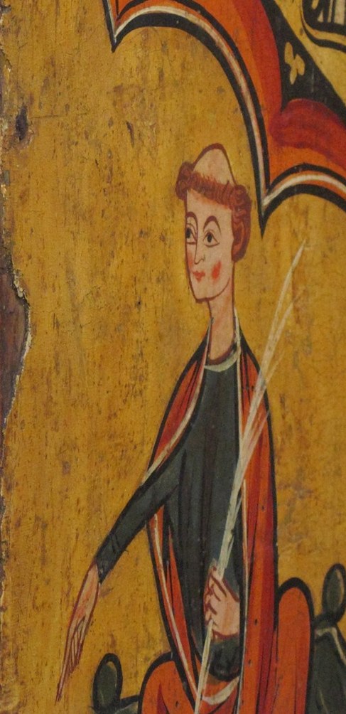 But look closely at the banner above the main figure.