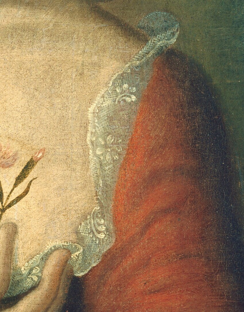 See the faint shadows on her delicate lace trim.