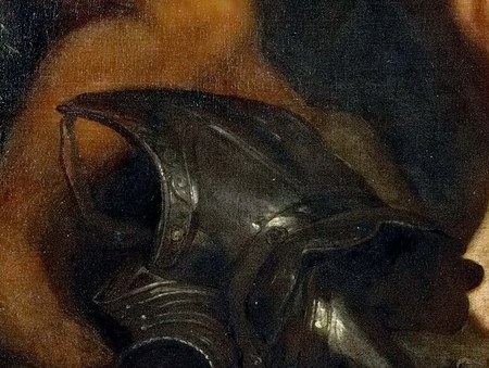 A discarded helmet lies in the foreground.