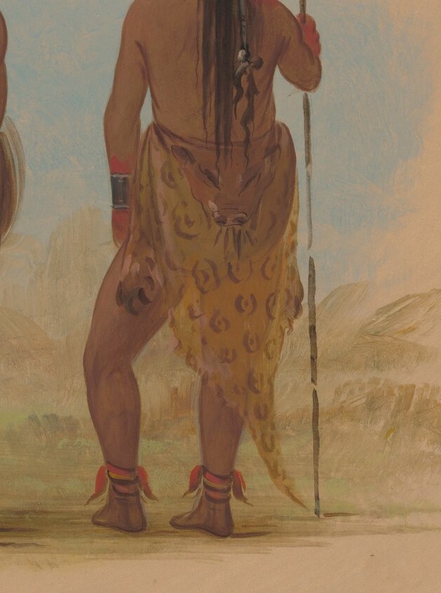 Their attire reflects cultural identity and martial aspects.