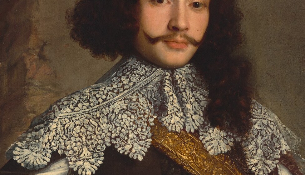 His elegant attire and lace collar speak to his high status.