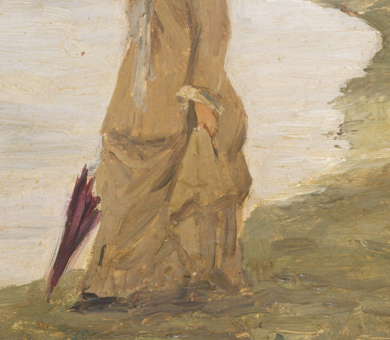 Her muted coat flows into the landscape.