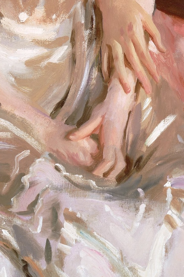 He captures the tender bond in their intertwined hands.