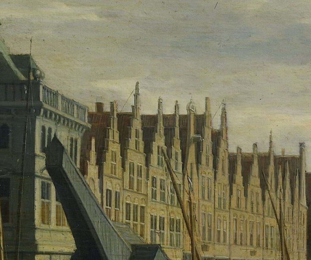 The Waag, a weigh-house, stands at the river's edge.