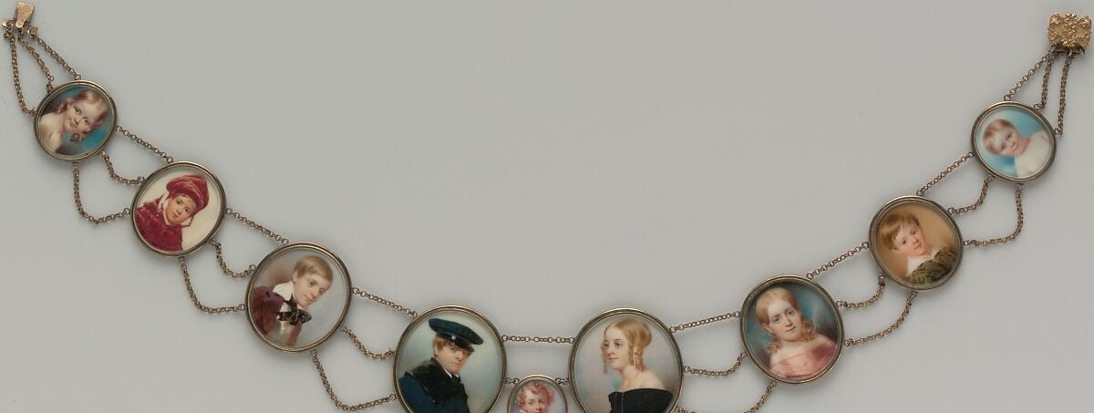 The central conceptual surprise and the work's entire meaning: the title's 'pearls' are not gemstones but loved ones , a viewer who reads the label last experiences a complete emotional re-seeing of the object