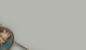 Strongest warm-color accent in the chain; the red pigment is exceptional for miniature on ivory and arrests the eye early