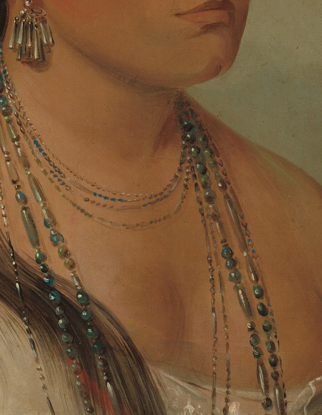 Look at the incredible detail of her necklaces.