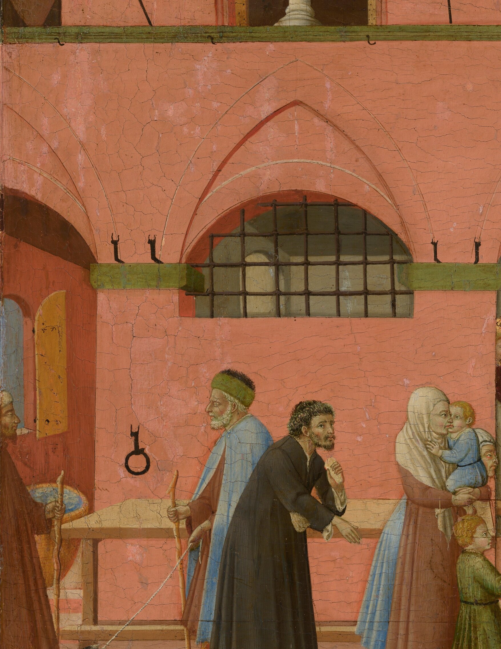 The warm, largely unmodulated earth-red pigment , characteristic of Sienese tempera , acts as a stage flat; its evenness throws all figure color into relief and reveals the panel-painting technique at a glance.