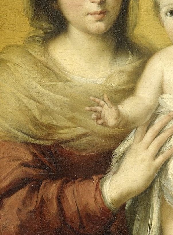 Notice her sheer veil, and his hand reaching out.