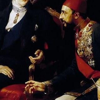 Beside him, Mehmed Emin Âli Pasha, of the Ottoman Empire.