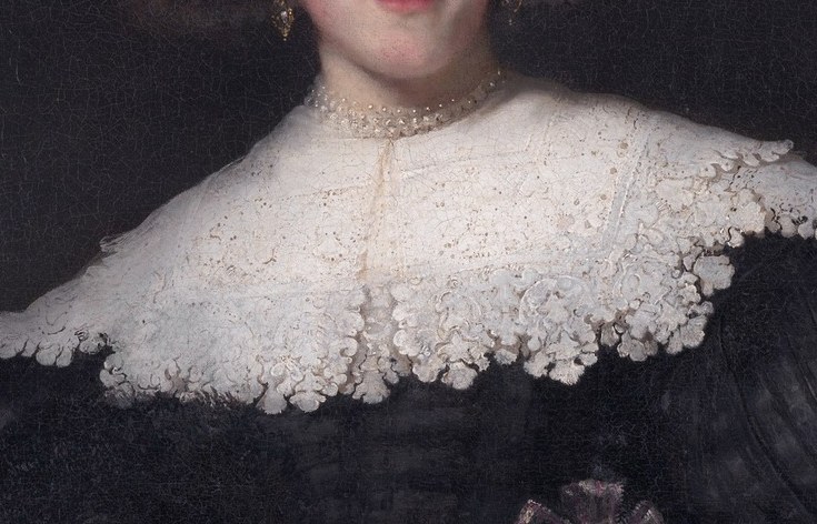 Her lace collar shows Rembrandt's mastery.