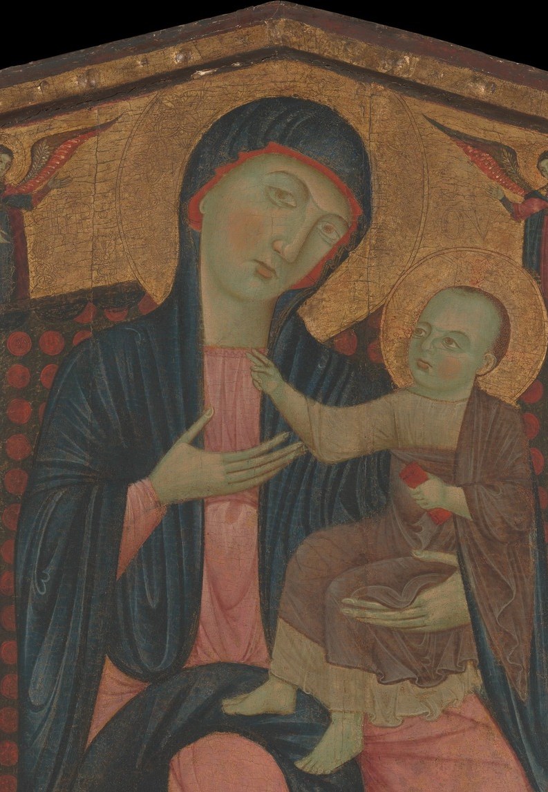 Medieval viewers saw the eternal divine radiance, made literal in metal leaf.