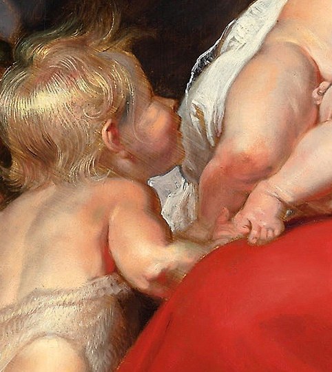 Saint John reaches for the child.